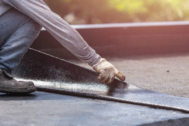 Professional Basement Waterproofing technician working in Sharpsburg, PA